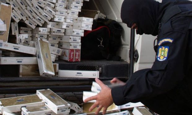 Contrabandă cu ţigări printr-o firmă de curierat