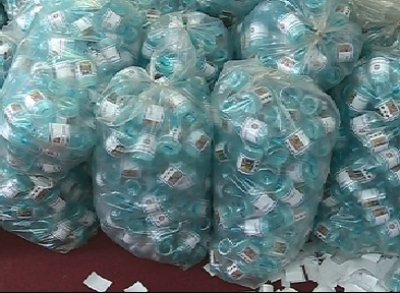 Arhiepiscopia Tomisului pregăteşte 150.000 de sticle cu apă sfinţită