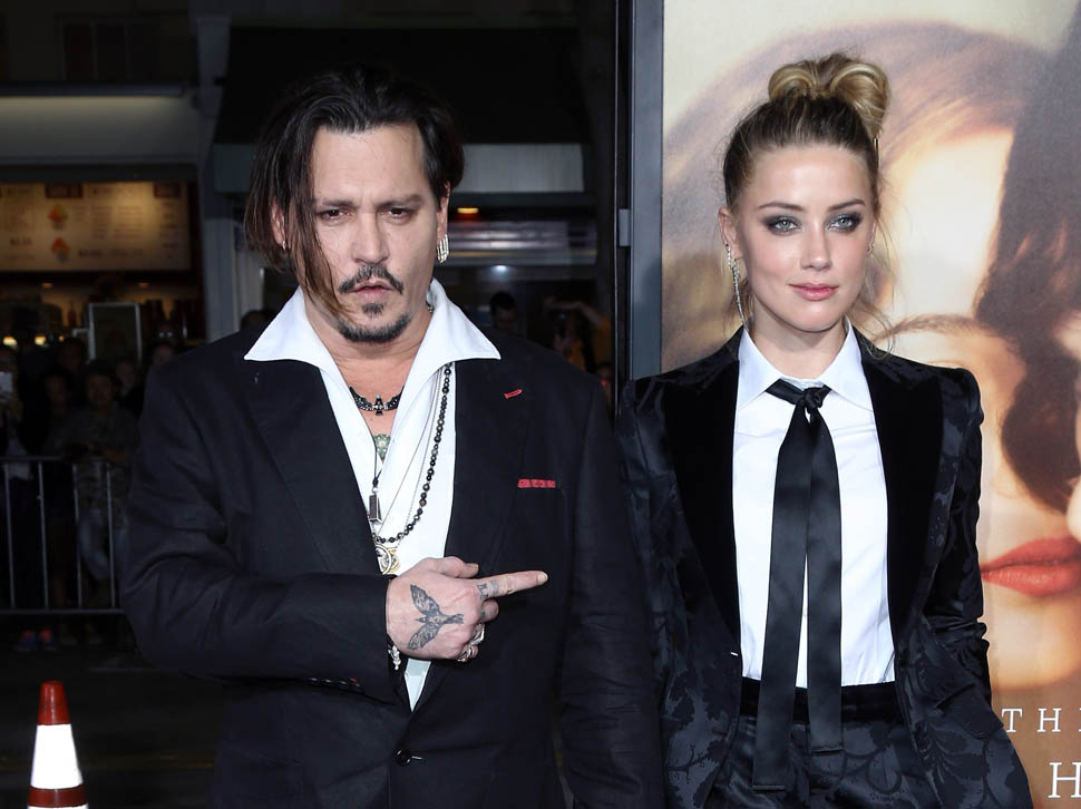 Amber Heard îl acuză pe Johnny Depp de violenţă domestică