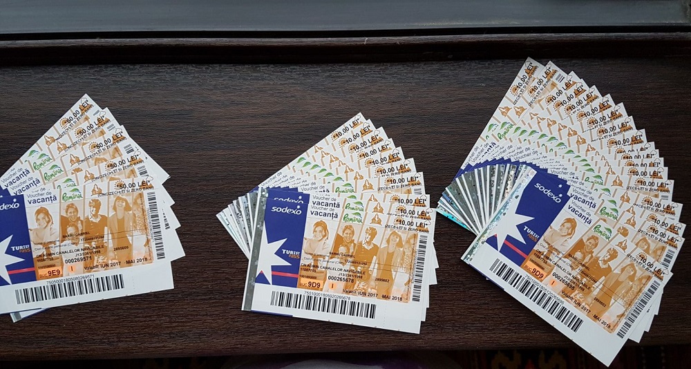 Guvernul a aprobat normele de acordare a voucherelor de vacanţă